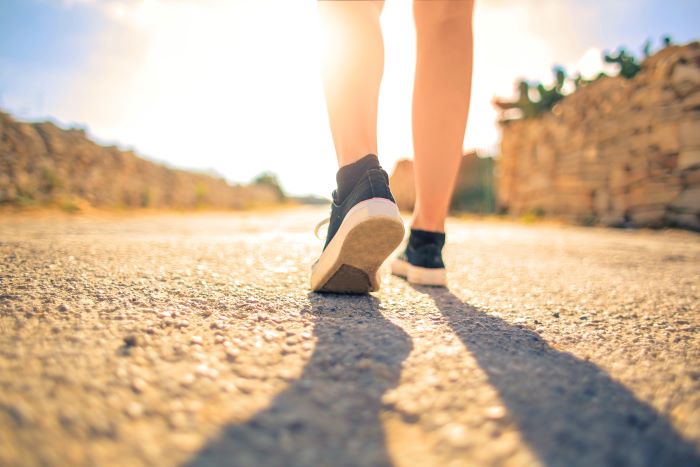 Person walking on a nature path